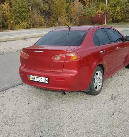 Червоний Міцубісі Lancer, об'ємом двигуна 2 л та пробігом 217 тис. км за 7100 $, фото 15 на Automoto.ua