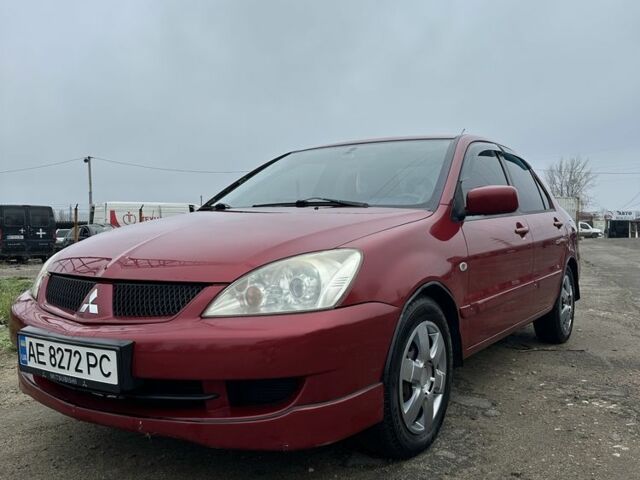 Червоний Міцубісі Lancer, об'ємом двигуна 1.6 л та пробігом 224 тис. км за 4300 $, фото 1 на Automoto.ua