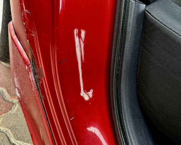 Красный Мицубиси Лансер, объемом двигателя 2 л и пробегом 365 тыс. км за 5000 $, фото 25 на Automoto.ua