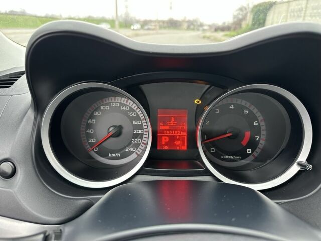 Красный Мицубиси Лансер, объемом двигателя 2 л и пробегом 366 тыс. км за 6500 $, фото 14 на Automoto.ua