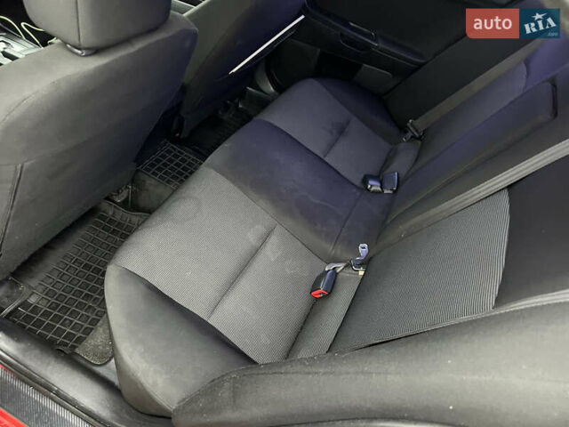 Красный Мицубиси Лансер, объемом двигателя 2 л и пробегом 330 тыс. км за 5250 $, фото 18 на Automoto.ua