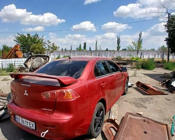 Красный Мицубиси Лансер, объемом двигателя 2 л и пробегом 192 тыс. км за 3000 $, фото 7 на Automoto.ua