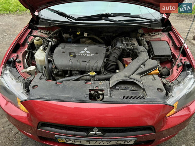 Червоний Міцубісі Lancer, об'ємом двигуна 2 л та пробігом 366 тис. км за 6500 $, фото 32 на Automoto.ua