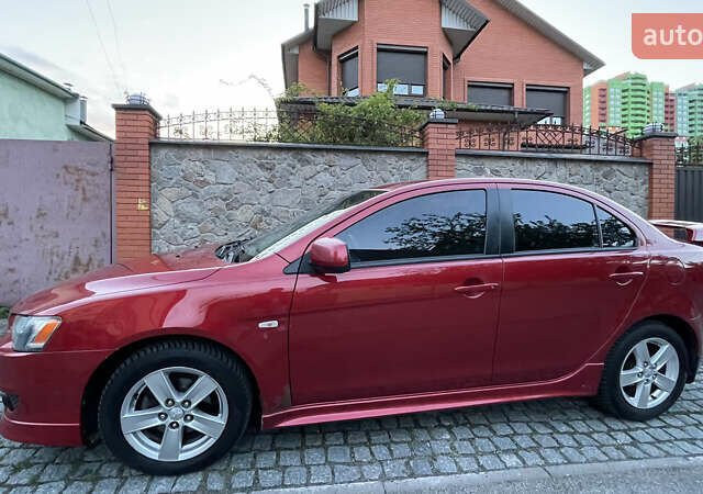 Міцубісі Lancer 2008 у Києві на Automoto.ua Червоний Міцубісі Lancer, об'ємом двигуна 2 л та пробігом 250 тис. км за 7000 $, фото 5 на Automoto.ua