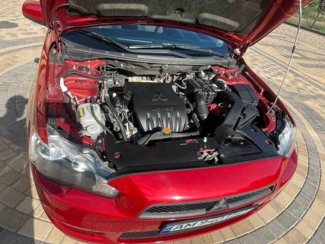 Червоний Міцубісі Lancer, об'ємом двигуна 1.5 л та пробігом 211 тис. км за 6900 $, фото 3 на Automoto.ua