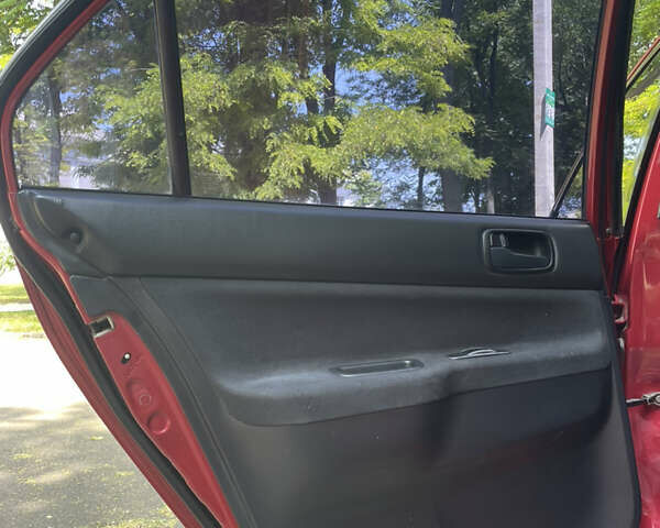 Червоний Міцубісі Lancer, об'ємом двигуна 1.6 л та пробігом 270 тис. км за 5699 $, фото 29 на Automoto.ua