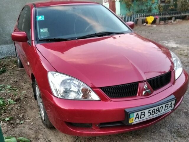 Червоний Міцубісі Lancer, об'ємом двигуна 1.6 л та пробігом 141 тис. км за 4000 $, фото 1 на Automoto.ua