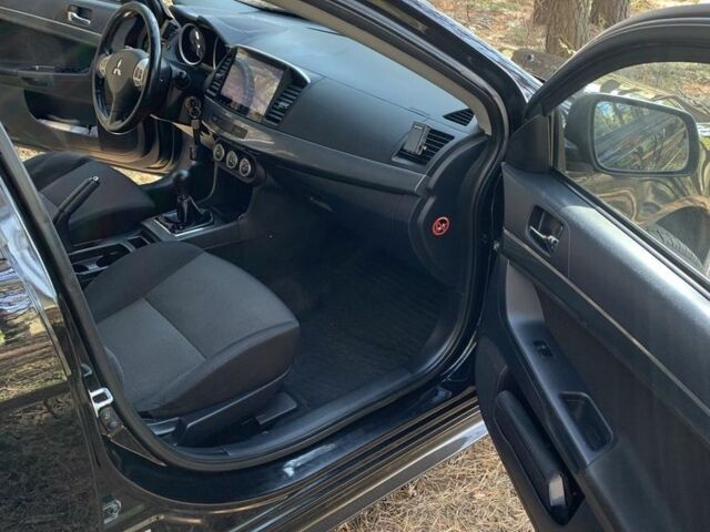 Мицубиси Лансер 2008 в Полтаве на Automoto.ua Красный Мицубиси Лансер, объемом двигателя 2 л и пробегом 170 тыс. км за 7200 $, фото 5 на Automoto.ua