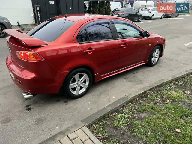 Красный Мицубиси Лансер, объемом двигателя 2 л и пробегом 330 тыс. км за 5250 $, фото 20 на Automoto.ua