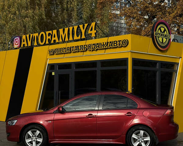 Червоний Міцубісі Lancer, об'ємом двигуна 2 л та пробігом 215 тис. км за 6500 $, фото 7 на Automoto.ua
