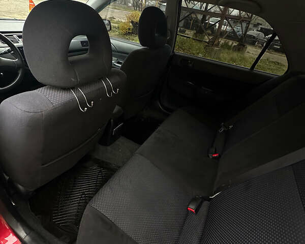 Червоний Міцубісі Lancer, об'ємом двигуна 1.6 л та пробігом 224 тис. км за 4300 $, фото 6 на Automoto.ua