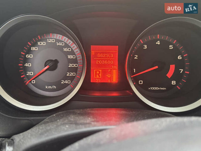 Червоний Міцубісі Lancer, об'ємом двигуна 2 л та пробігом 203 тис. км за 8000 $, фото 38 на Automoto.ua
