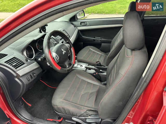 Червоний Міцубісі Lancer, об'ємом двигуна 2 л та пробігом 366 тис. км за 6500 $, фото 42 на Automoto.ua