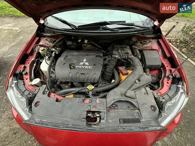 Червоний Міцубісі Lancer, об'ємом двигуна 2 л та пробігом 366 тис. км за 6500 $, фото 37 на Automoto.ua