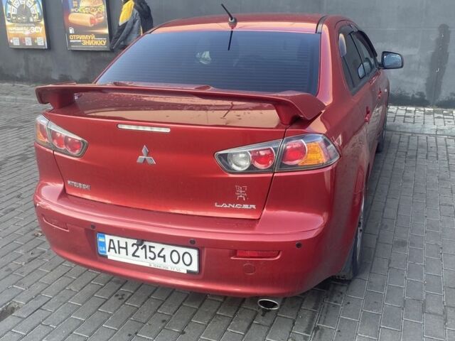 Червоний Міцубісі Lancer, об'ємом двигуна 2 л та пробігом 200 тис. км за 5350 $, фото 5 на Automoto.ua