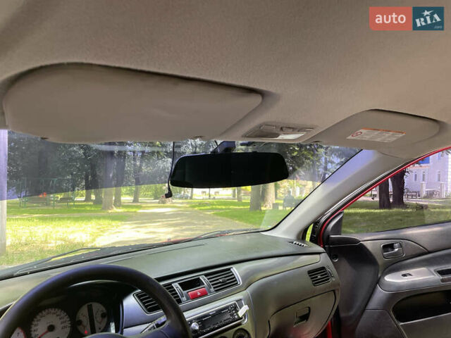 Червоний Міцубісі Lancer, об'ємом двигуна 1.6 л та пробігом 270 тис. км за 5699 $, фото 49 на Automoto.ua