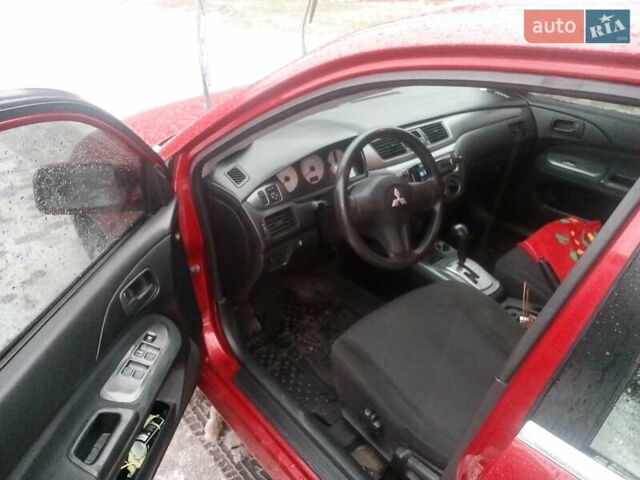 Червоний Міцубісі Lancer, об'ємом двигуна 1.6 л та пробігом 242 тис. км за 5100 $, фото 3 на Automoto.ua