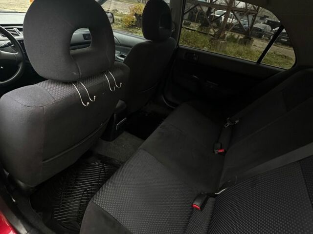 Червоний Міцубісі Lancer, об'ємом двигуна 1.6 л та пробігом 224 тис. км за 4300 $, фото 7 на Automoto.ua