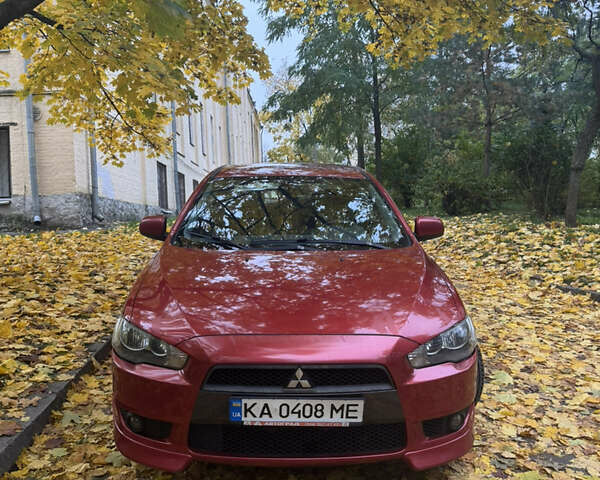 Червоний Міцубісі Lancer, об'ємом двигуна 2 л та пробігом 203 тис. км за 8000 $, фото 6 на Automoto.ua