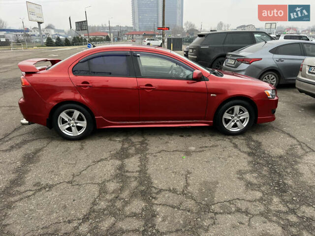 Красный Мицубиси Лансер, объемом двигателя 2 л и пробегом 330 тыс. км за 5250 $, фото 5 на Automoto.ua