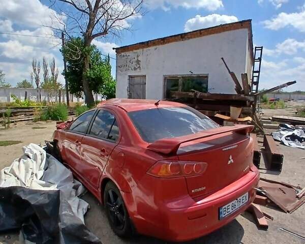 Красный Мицубиси Лансер, объемом двигателя 2 л и пробегом 192 тыс. км за 3000 $, фото 3 на Automoto.ua