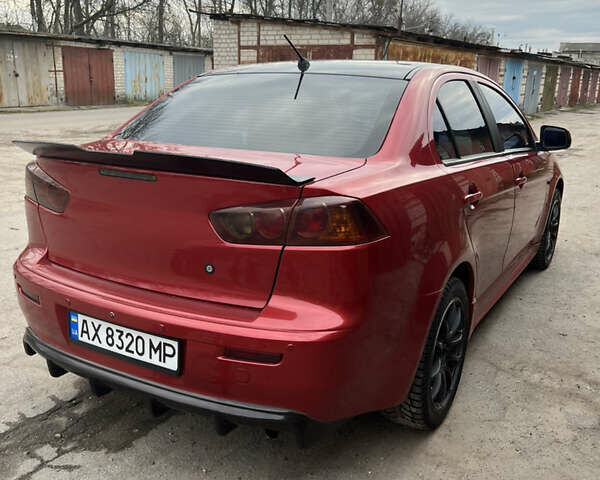 Червоний Міцубісі Lancer, об'ємом двигуна 2 л та пробігом 209 тис. км за 6900 $, фото 6 на Automoto.ua