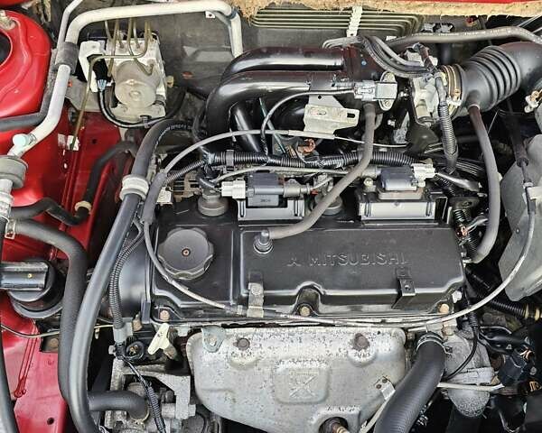Червоний Міцубісі Lancer, об'ємом двигуна 1.6 л та пробігом 220 тис. км за 5800 $, фото 17 на Automoto.ua