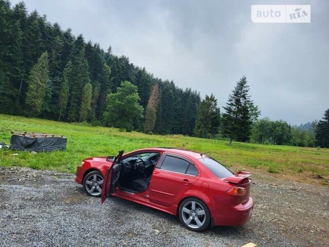 Червоний Міцубісі Lancer, об'ємом двигуна 2 л та пробігом 140 тис. км за 8500 $, фото 1 на Automoto.ua