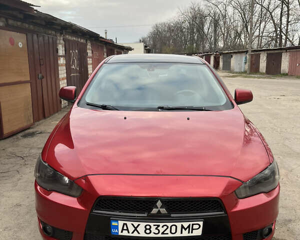 Червоний Міцубісі Lancer, об'ємом двигуна 2 л та пробігом 209 тис. км за 6900 $, фото 7 на Automoto.ua