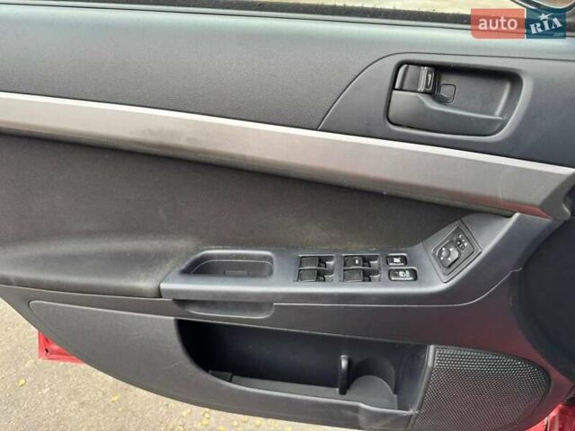 Червоний Міцубісі Lancer, об'ємом двигуна 1.5 л та пробігом 190 тис. км за 6700 $, фото 11 на Automoto.ua