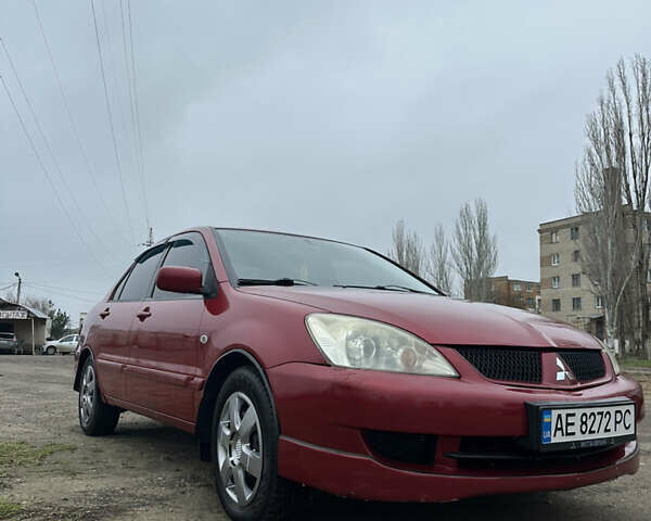 Червоний Міцубісі Lancer, об'ємом двигуна 1.6 л та пробігом 224 тис. км за 4300 $, фото 3 на Automoto.ua