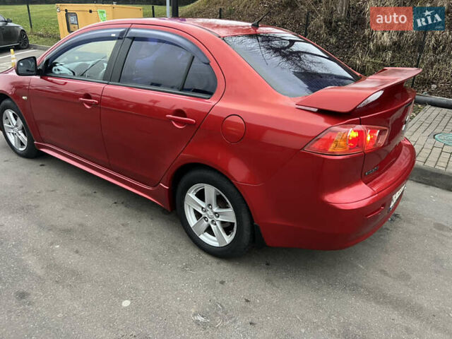 Красный Мицубиси Лансер, объемом двигателя 2 л и пробегом 330 тыс. км за 5250 $, фото 22 на Automoto.ua