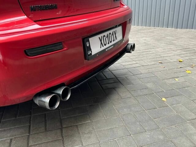 Червоний Міцубісі Lancer, об'ємом двигуна 2 л та пробігом 137 тис. км за 8500 $, фото 4 на Automoto.ua