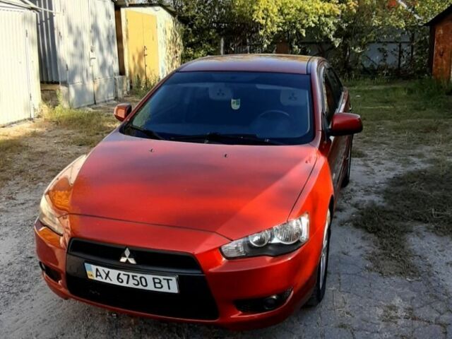 Красный Мицубиси Лансер, объемом двигателя 2 л и пробегом 110 тыс. км за 7500 $, фото 4 на Automoto.ua