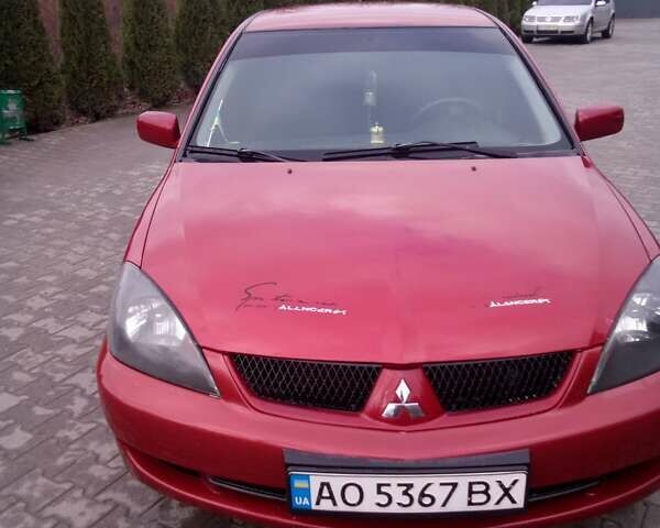 Червоний Міцубісі Lancer, об'ємом двигуна 1.6 л та пробігом 191 тис. км за 4900 $, фото 4 на Automoto.ua