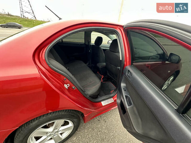 Червоний Міцубісі Lancer, об'ємом двигуна 2 л та пробігом 366 тис. км за 6500 $, фото 7 на Automoto.ua