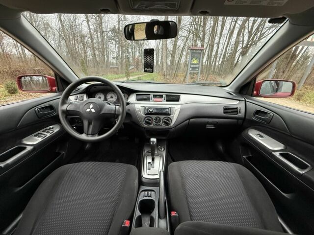 Червоний Міцубісі Lancer, об'ємом двигуна 1.6 л та пробігом 220 тис. км за 4600 $, фото 16 на Automoto.ua