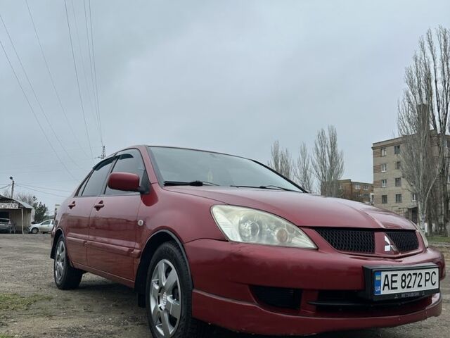 Червоний Міцубісі Lancer, об'ємом двигуна 1.6 л та пробігом 224 тис. км за 4300 $, фото 4 на Automoto.ua