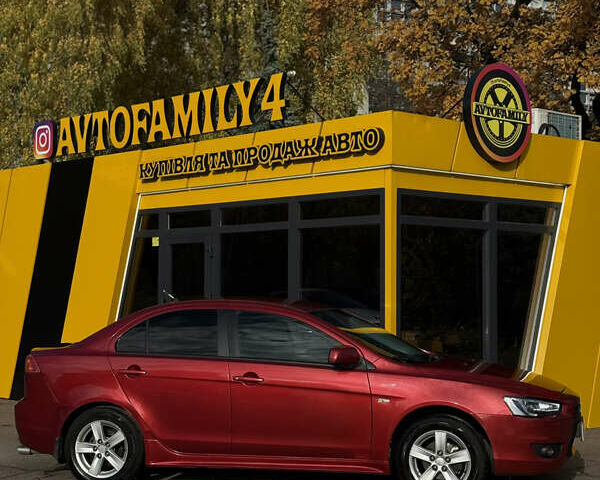 Червоний Міцубісі Lancer, об'ємом двигуна 2 л та пробігом 215 тис. км за 6500 $, фото 6 на Automoto.ua