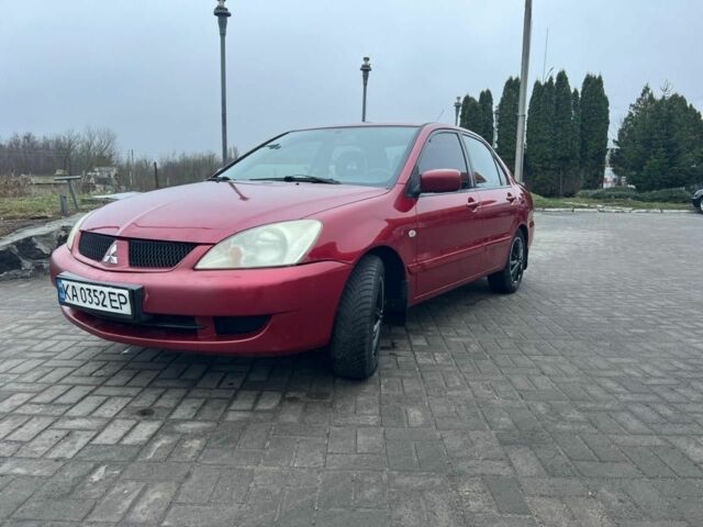 Красный Мицубиси Лансер, объемом двигателя 1.6 л и пробегом 265 тыс. км за 2956 $, фото 11 на Automoto.ua