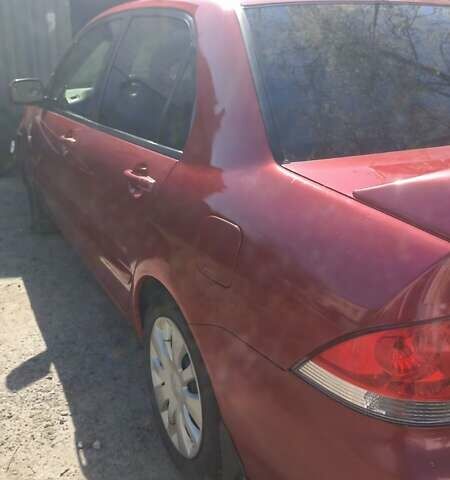 Мицубиси Лансер 2008 в Львове на Automoto.ua Красный Мицубиси Лансер, объемом двигателя 1.58 л и пробегом 280 тыс. км за 3200 $, фото 21 на Automoto.ua