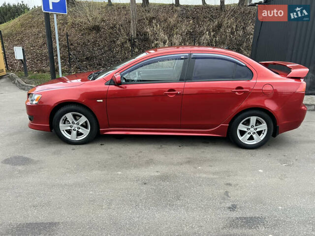 Красный Мицубиси Лансер, объемом двигателя 2 л и пробегом 330 тыс. км за 5250 $, фото 23 на Automoto.ua