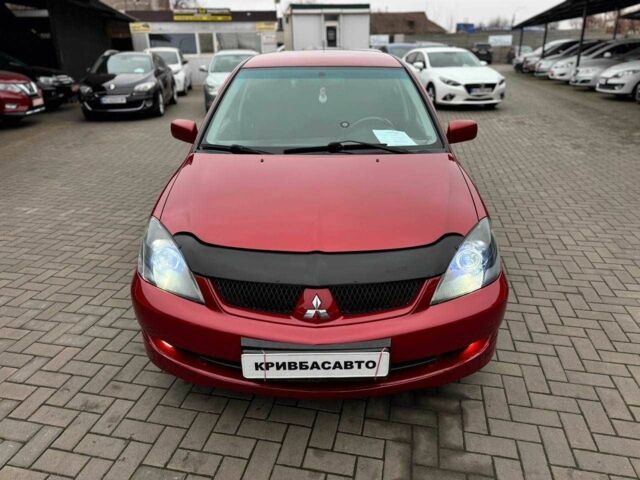 Красный Мицубиси Лансер, объемом двигателя 1.6 л и пробегом 215 тыс. км за 4500 $, фото 2 на Automoto.ua