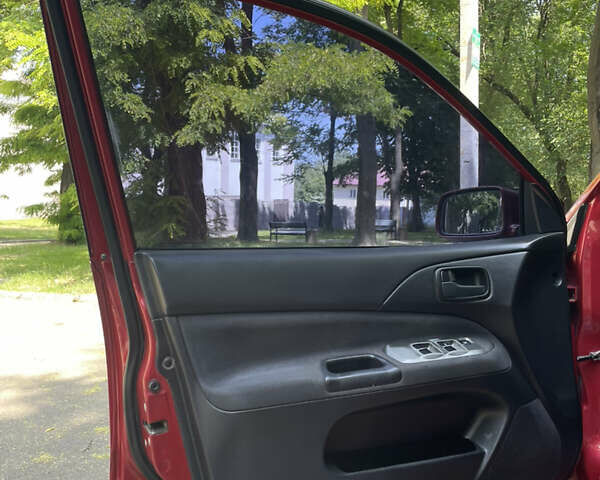 Червоний Міцубісі Lancer, об'ємом двигуна 1.6 л та пробігом 270 тис. км за 5699 $, фото 28 на Automoto.ua