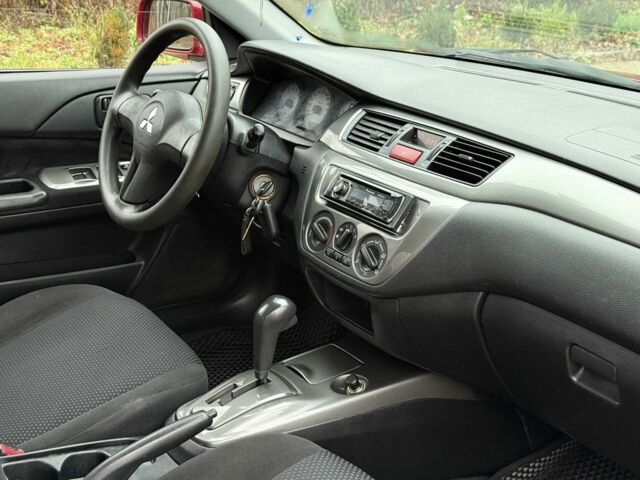 Червоний Міцубісі Lancer, об'ємом двигуна 1.6 л та пробігом 220 тис. км за 4600 $, фото 15 на Automoto.ua