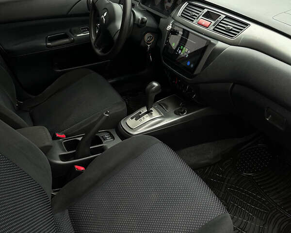 Червоний Міцубісі Lancer, об'ємом двигуна 1.6 л та пробігом 224 тис. км за 4300 $, фото 5 на Automoto.ua