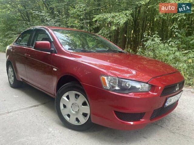Красный Мицубиси Лансер, объемом двигателя 1.5 л и пробегом 124 тыс. км за 7100 $, фото 2 на Automoto.ua