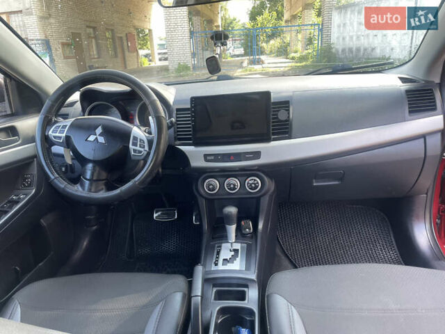 Червоний Міцубісі Lancer, об'ємом двигуна 2 л та пробігом 179 тис. км за 6499 $, фото 11 на Automoto.ua