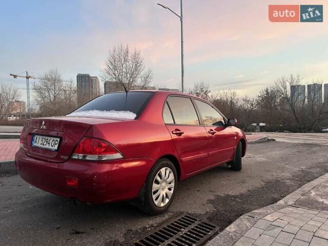 Червоний Міцубісі Lancer, об'ємом двигуна 1.6 л та пробігом 141 тис. км за 4700 $, фото 6 на Automoto.ua