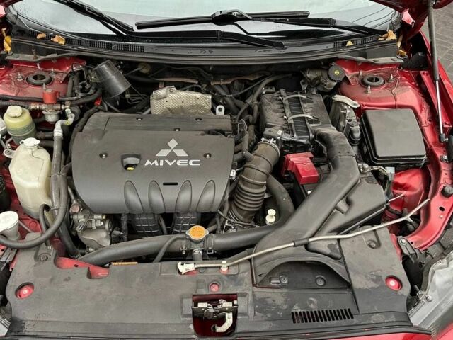 Червоний Міцубісі Lancer, об'ємом двигуна 2 л та пробігом 137 тис. км за 8500 $, фото 11 на Automoto.ua